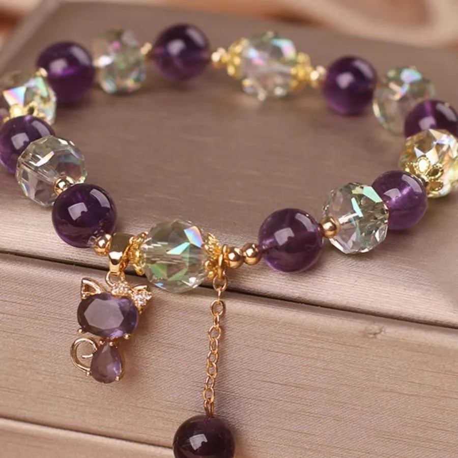Natural amethyst fox pendant bracelet with five-leaf flower and nine-tailed fox charm, antique style, on a neutral background
