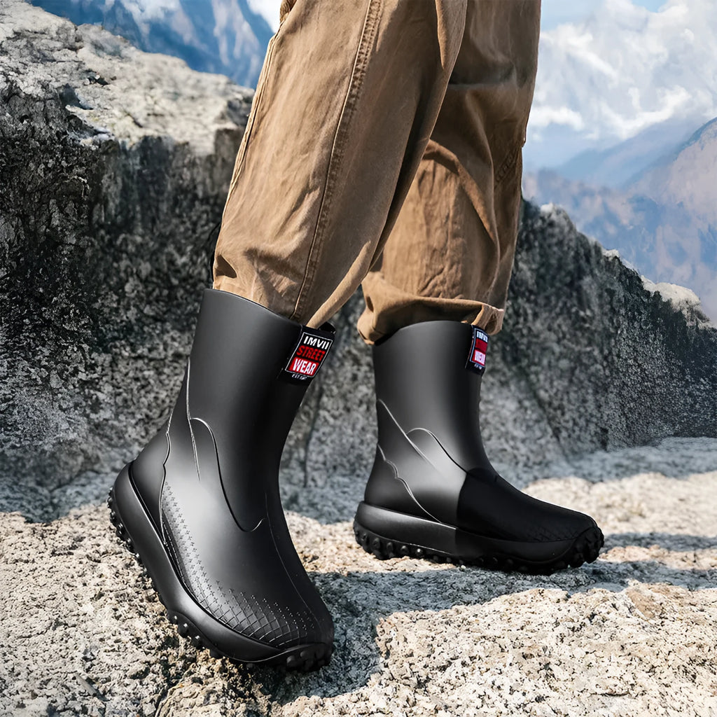 Men's mid low tube PVC rain boots in black, non-slip sole, flat heel, round toe