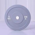 Macaron elastic rubber weight plate in green with large centre hole, colour-coded 10kg option