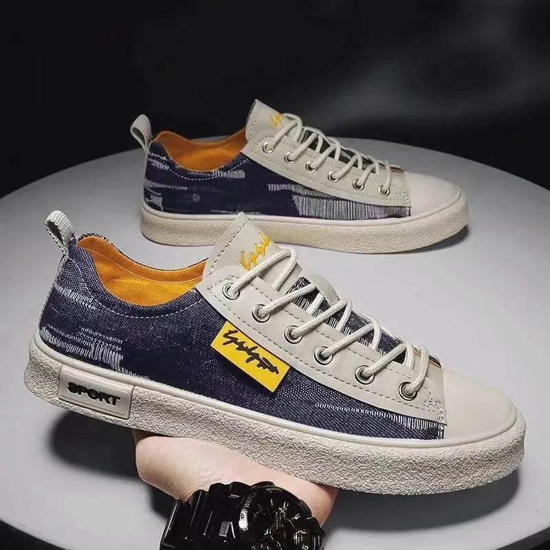 Men's canvas shoes in black, dark blue, and light blue with round toe and rubber sole