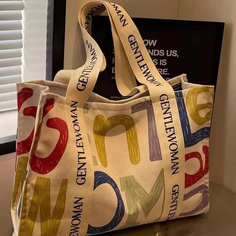 Canvas women's travel tote bag with large capacity and printed design options