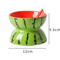 Ceramic elevated cat bowl with tilted design and decorative pattern