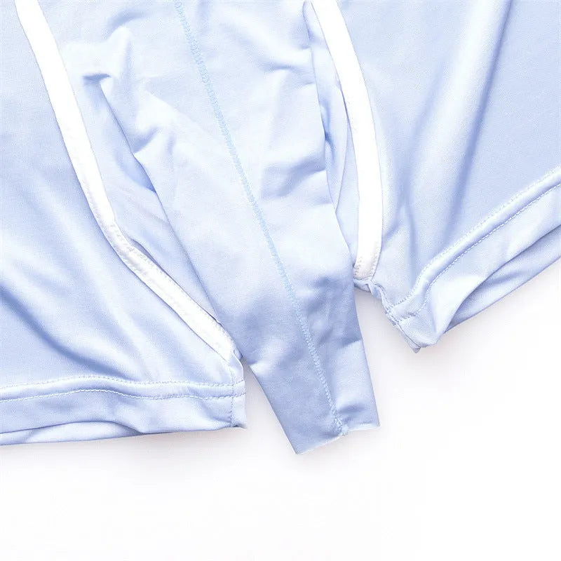 Men's solid colour ice silk boxer shorts on a mid-waist, showing available colours grey, black, green, and blue.