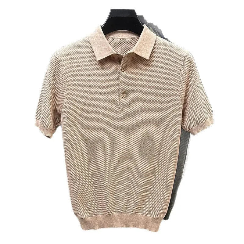 Loose pure cotton short sleeve pullover sweater in grey, shown laid flat.