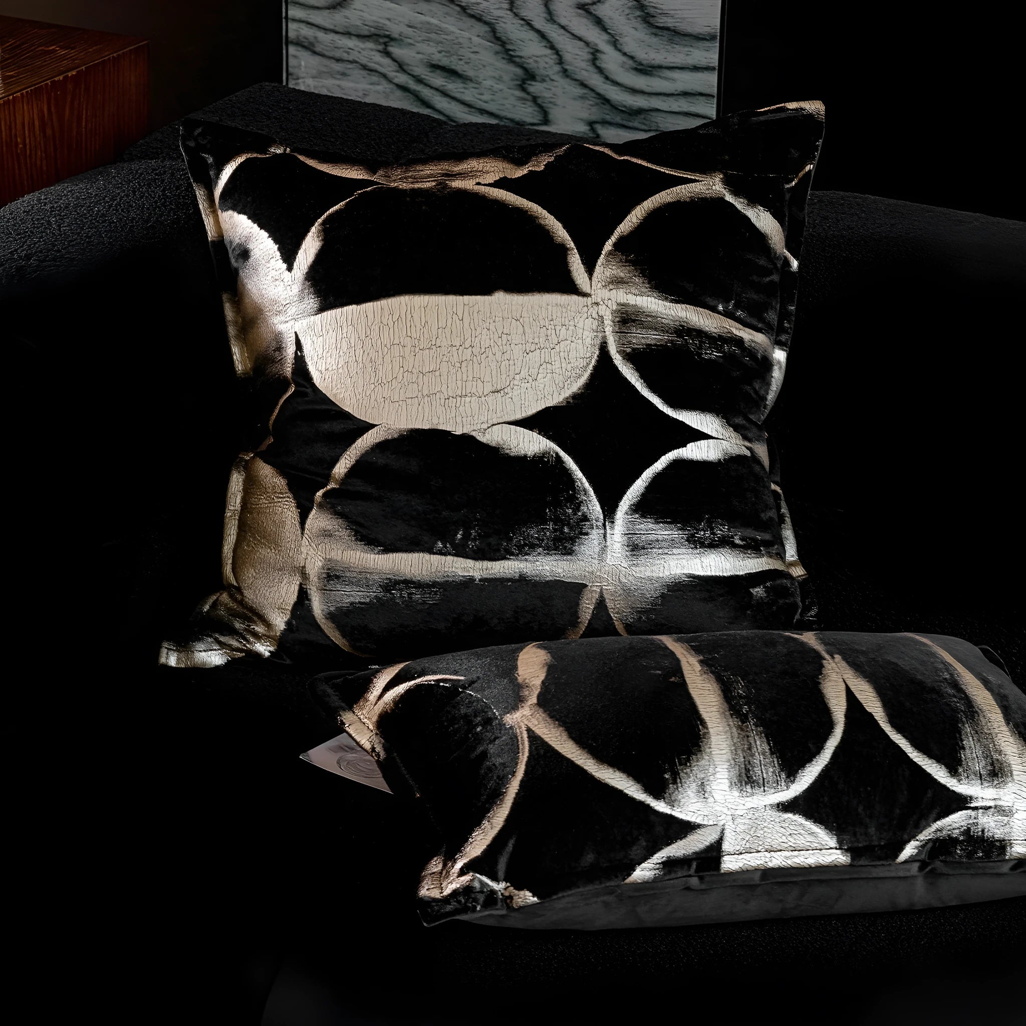 Black gold abstract pattern decorative flannel cushion with removable cover in three sizes.