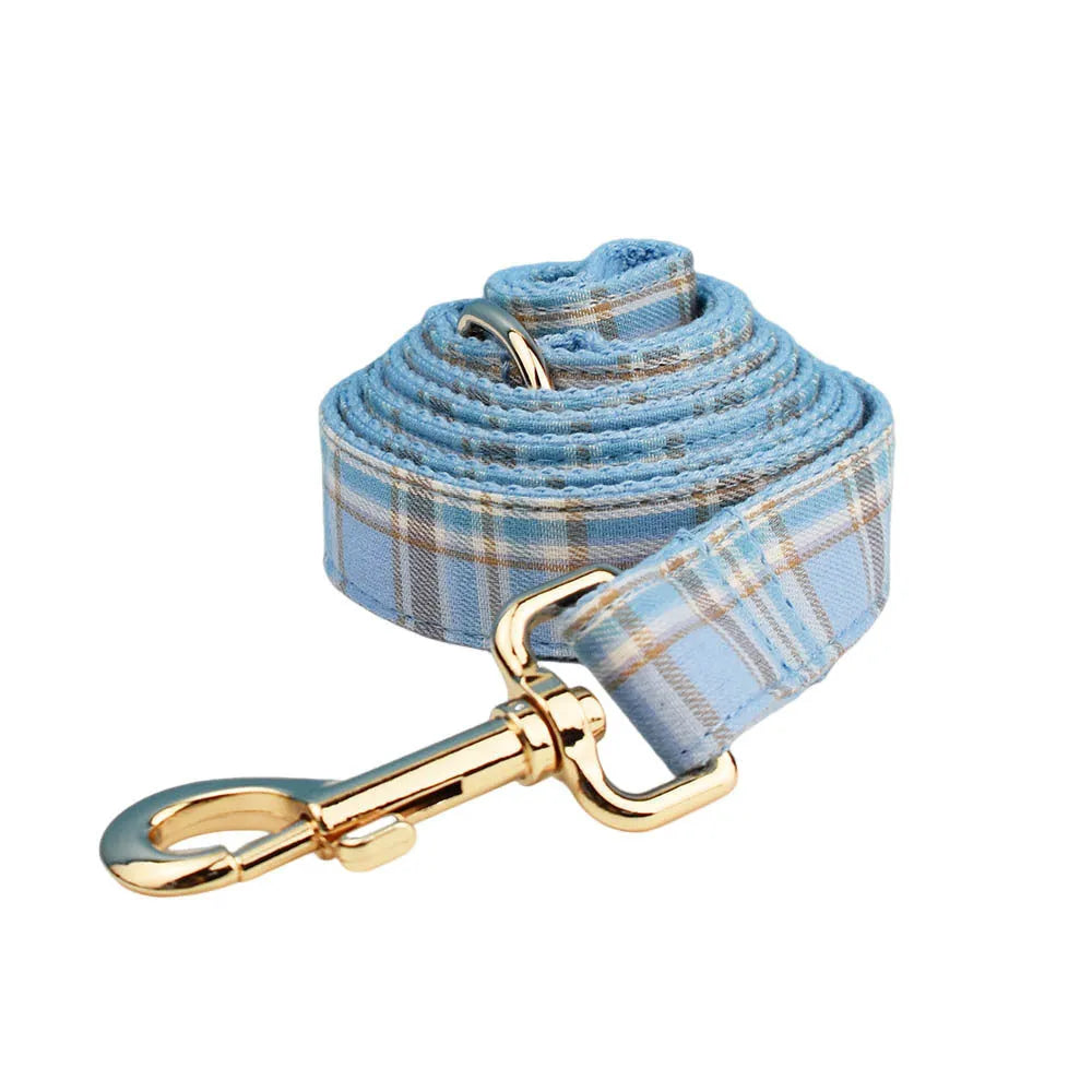 Sky blue grid forest dog collar and leash set with bow and vest on cloth material