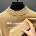 Men's solid colour half turtleneck long sleeve knitwear sweater in fine wool yarn.