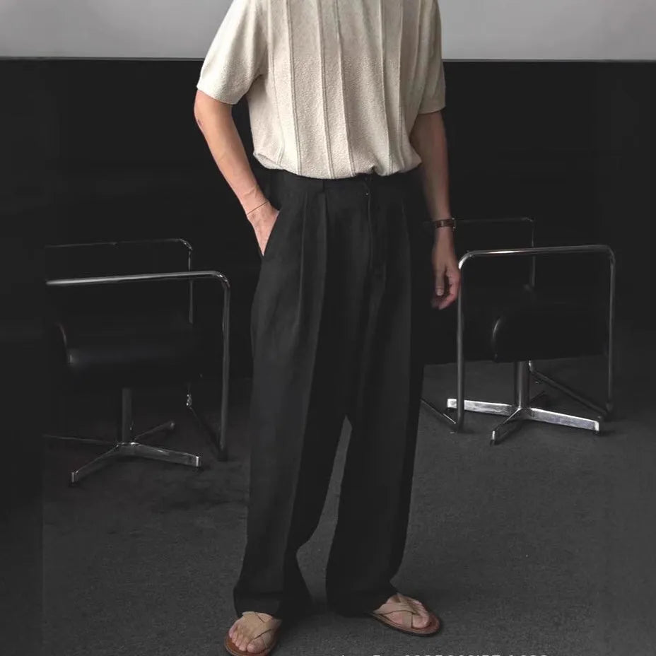 Men's loose fit cotton linen trousers in apricot, army green, and purplish blue, showing pencil leg opening.