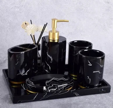 Ceramic bathroom set with emulsion bottle, cup, toothbrush holder, and soap dish in Phnom Penh Ink and Black bright glaze finish