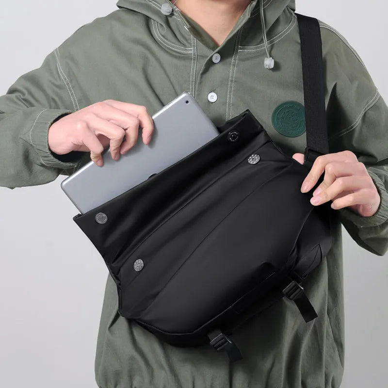 Grey PU leather crossbody bag showing internal phone and document compartments with zip opening