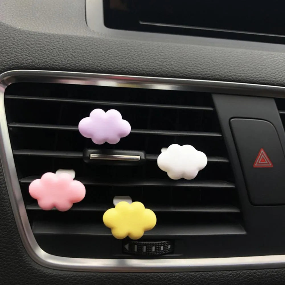 Resin Baiyun cartoon car fragrance clip in light green colour attached to car air vent