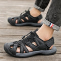 Men's LX01 Blue casual sports shoes with mesh upper, rubber sole, and Velcro strap.