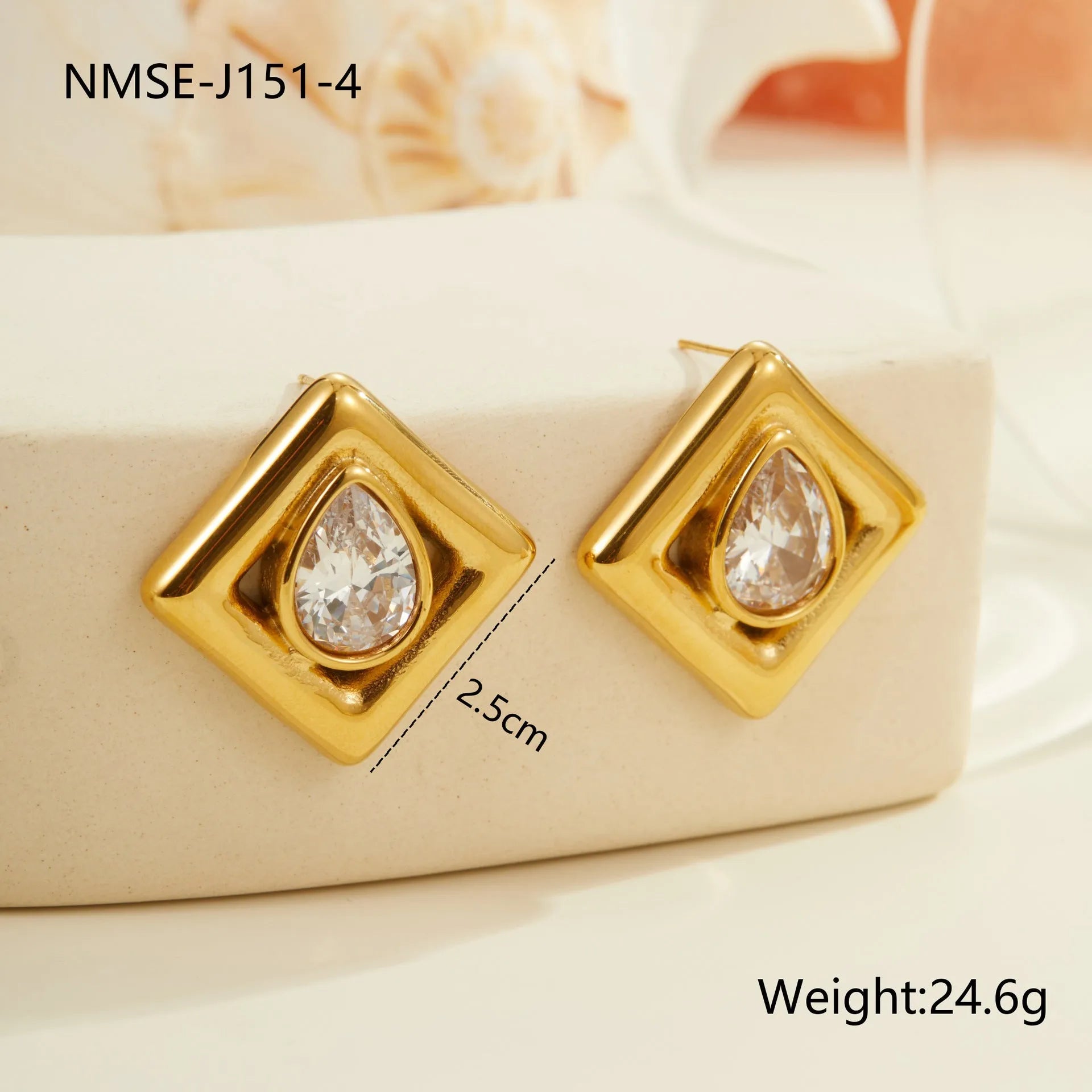 Gold electroplated stainless steel stud earrings with water drop zircon design