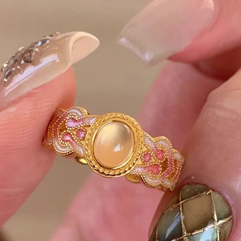 Escape K227 pink crystal enamel geometric open ring in gold-plated copper.