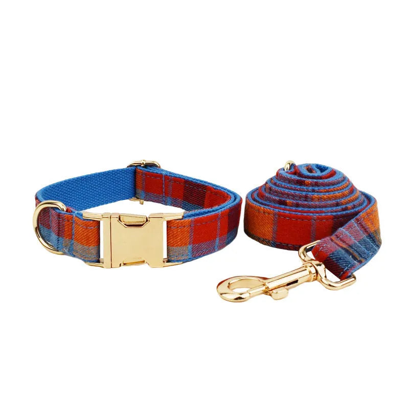 Blue velvet plaid dog collar set with cloth lead and hand holding rope on pet bandana