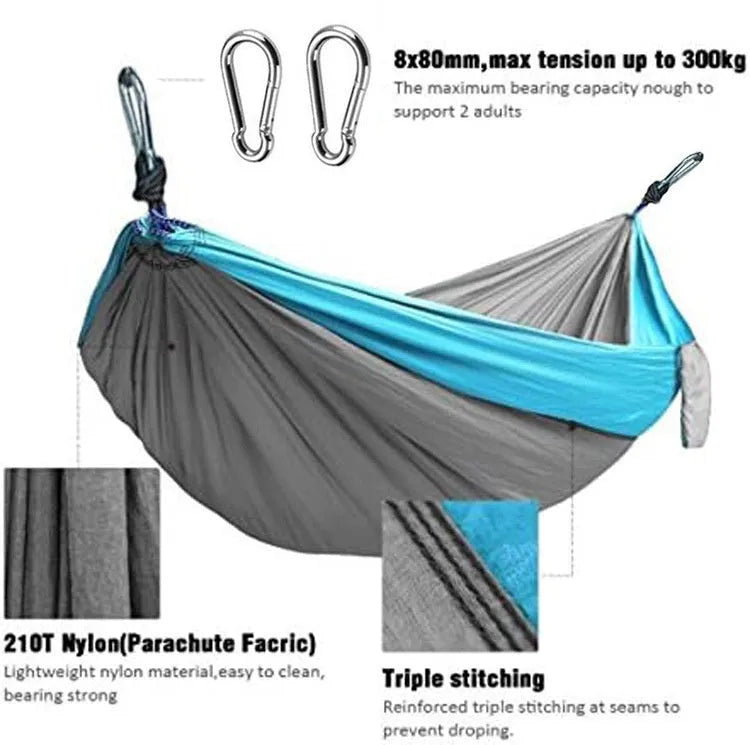 Blue nylon outdoor camping hammock with 300kg load capacity shown suspended between trees