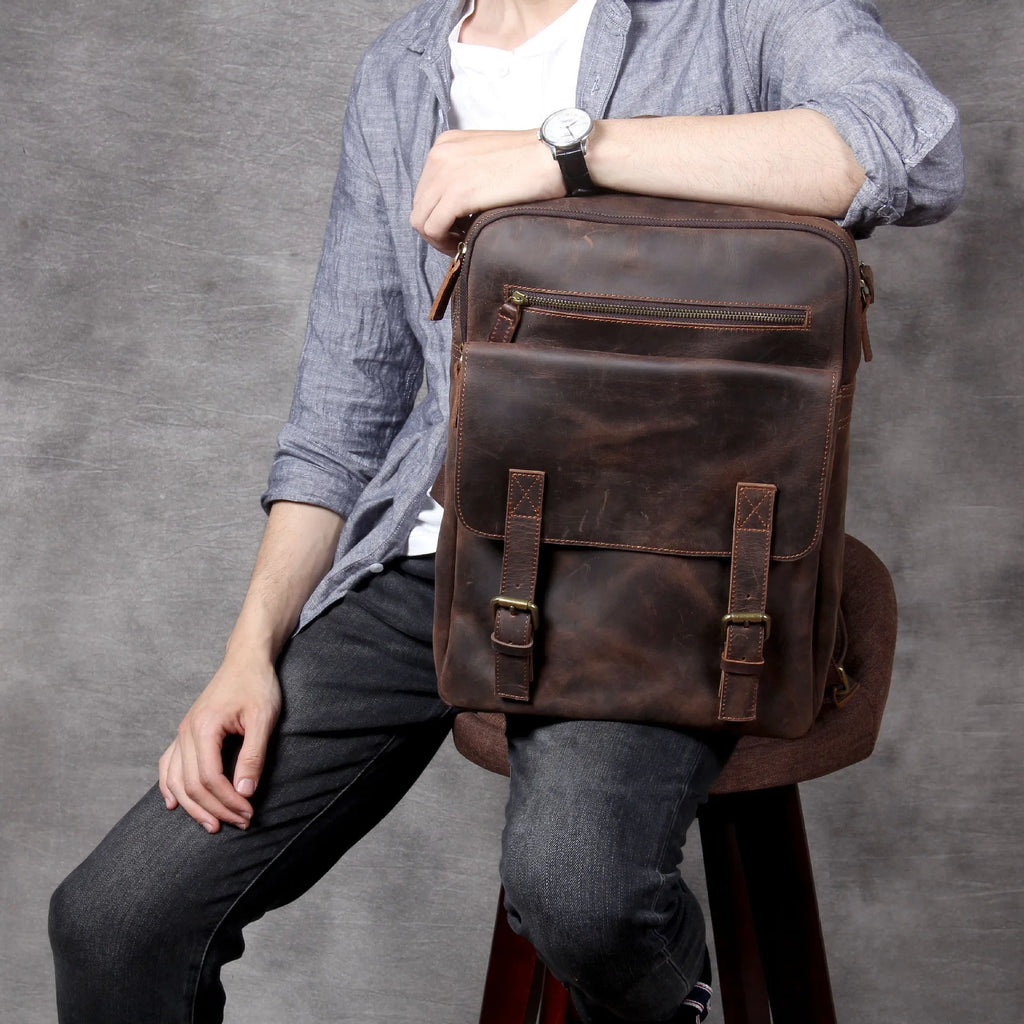 Retro crazy horse leather backpack in dark coffee colour with handmade stitching and front flap