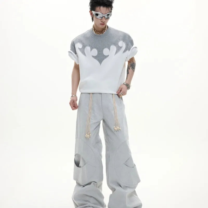 Men's loose fit T-shirt with burnt flower stitching and rhinestone detail on heavyweight cotton fabric