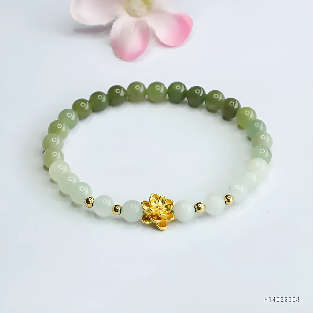 Hand-woven Hetian jade bracelet with a clear water gradient and national style floral design.