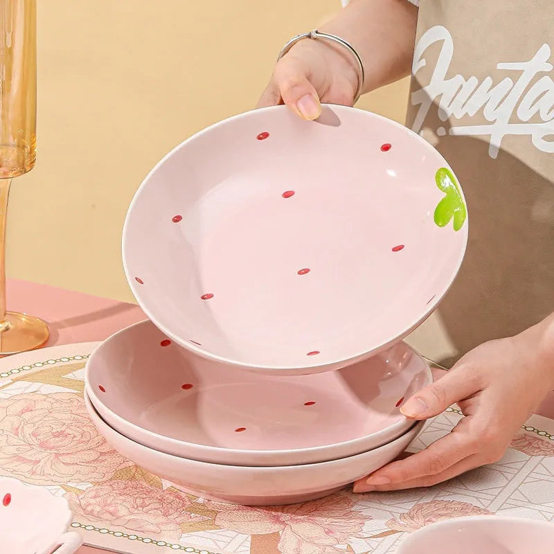 Cute strawberry pattern porcelain dinnerware set with flower bowls, plates, and a twist spoon