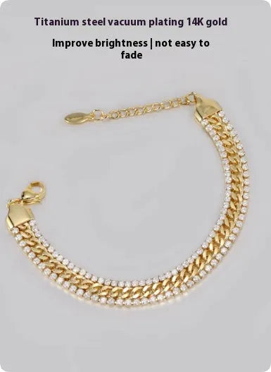 Gold electroplated unisex tennis bracelet on titanium steel with hip hop style and artificial gemstones.