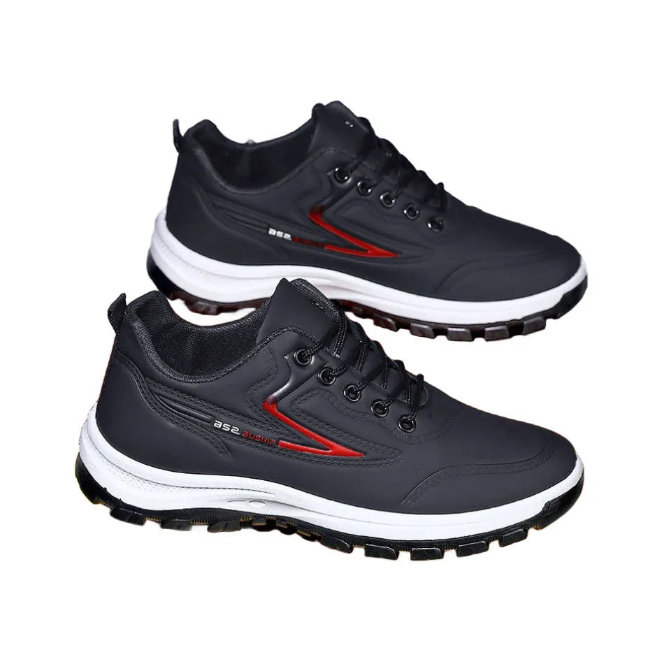 Waterproof leisure soft bottom sports work shoes in black and gray, low top, lace-up front, artificial PU upper