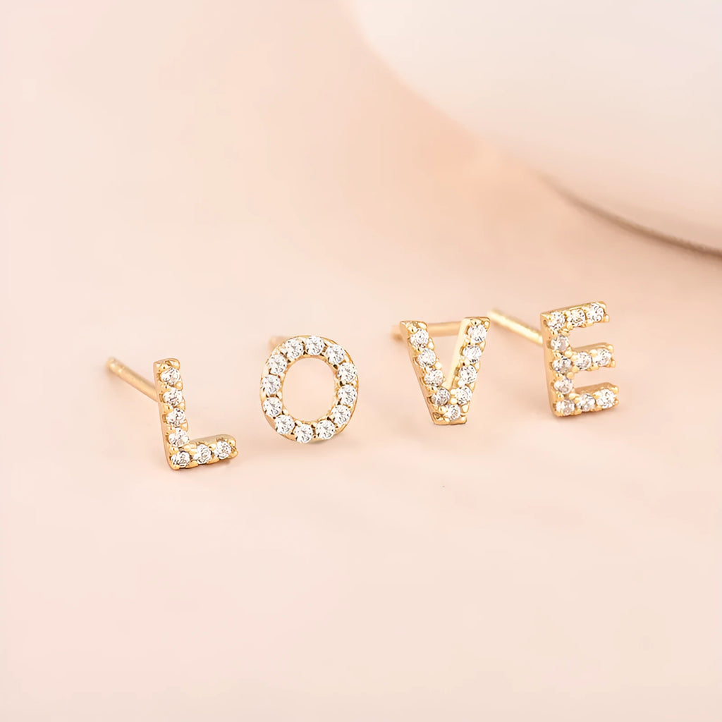 Brass gold plated alphabet letter earrings showing A to Z range on copper with zircon details