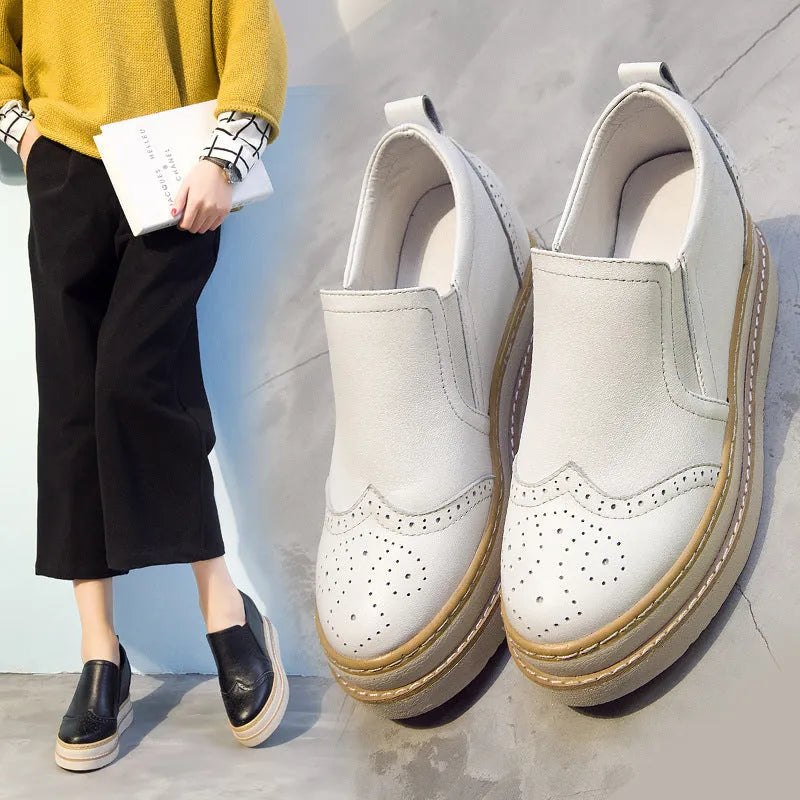 Women's genuine leather brogue platform shoes with metal detail and round toe in black