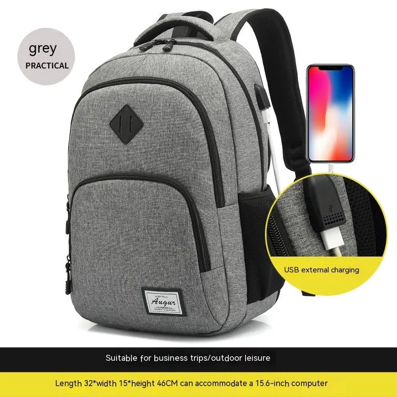 Gray USB charging backpack with luggage strap on a trolley case, showing charging port.