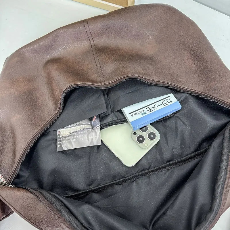 Retro large capacity men's crossbody bag in brown, black, and white PU leather with waterproof feature