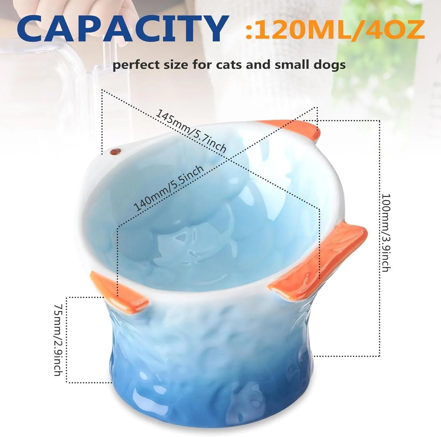 Blue ceramic fish-shaped cat feeder bowl with a tilted, elevated design on a non-slip base.