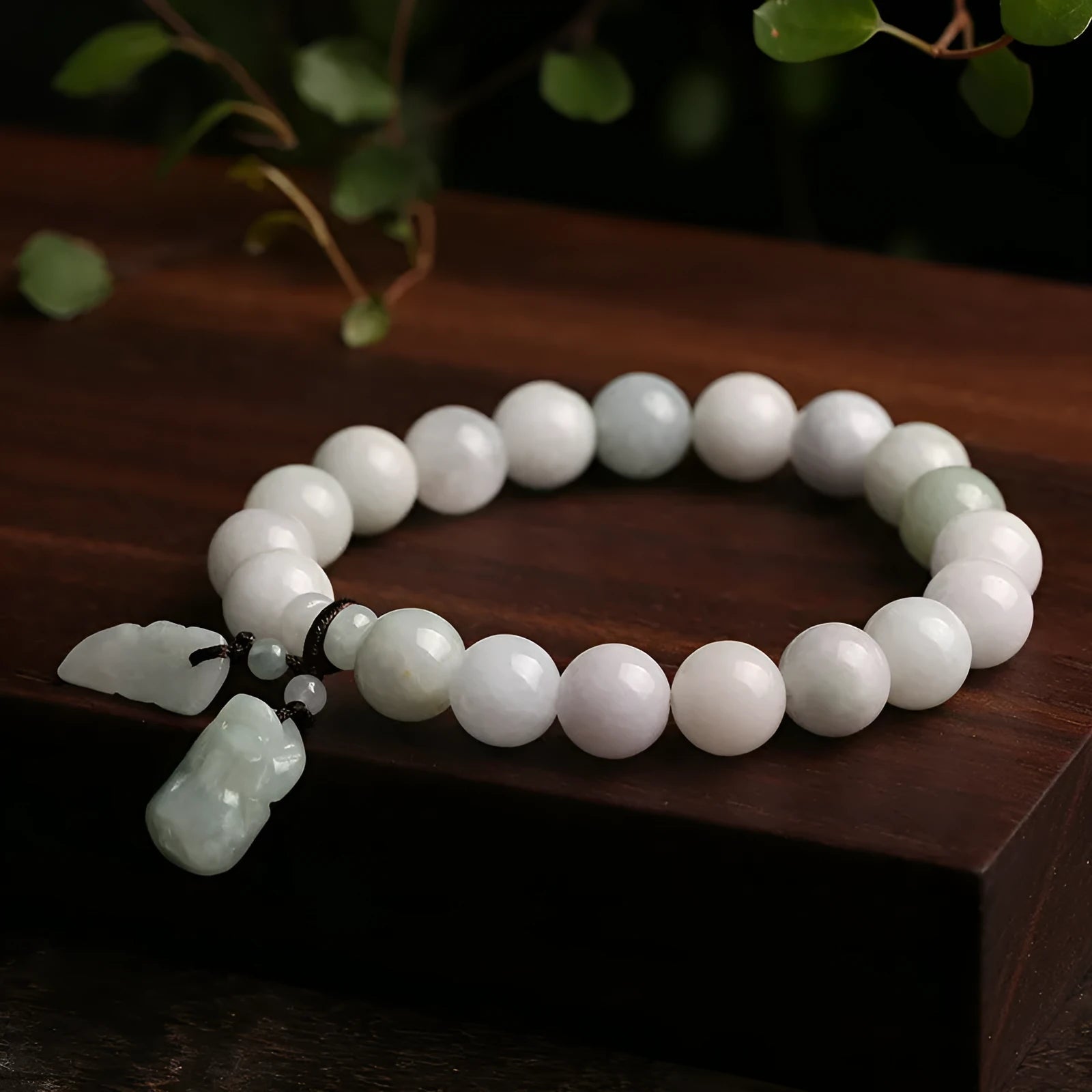Natural emerald jade bracelet with geometric design and Maitreya Buddha hanging charm
