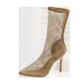 Gold mesh high heel sandals with pointed stiletto design showing oversleeves wearing method