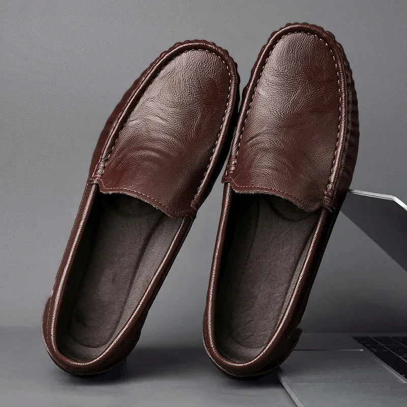 Mens brown casual driving shoes with leather upper, round toe, and stitching detail on a white background