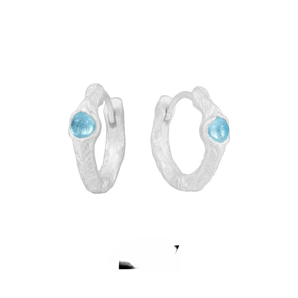 925 sterling silver geometric ear clip with burnt silver electroplating finish and circular design elements