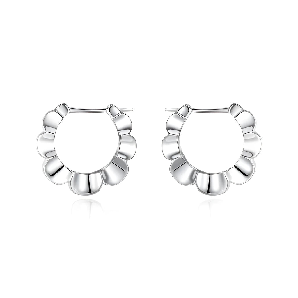 A pair of sterling silver geometric earrings with round details and an electroplated finish.