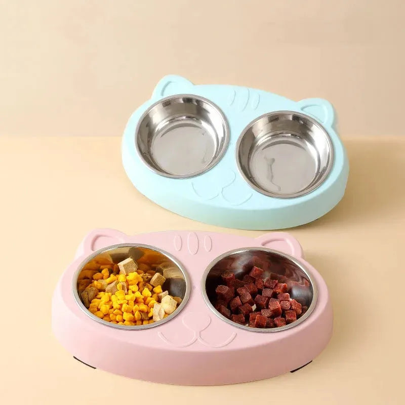 Blue plastic pet feeding tray with two built-in bowls for cat or dog food and water.