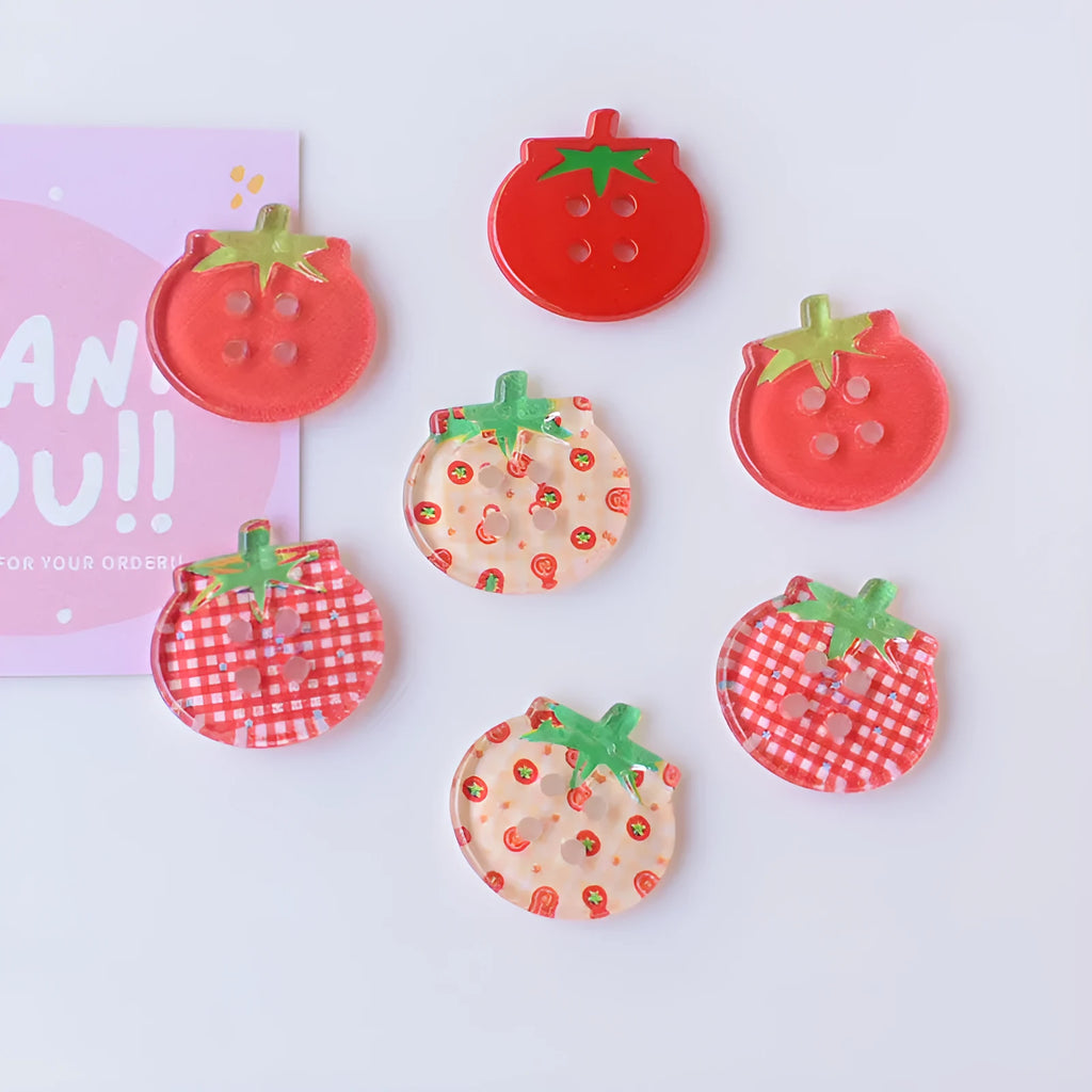 Tomato button ornament made of plastic or resin with printed pattern in medium size mixed colours