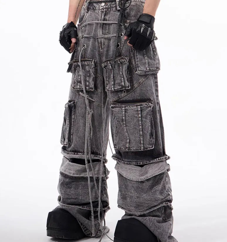 Grey cotton denim distressed overalls with rope stitching in mop pant style on model