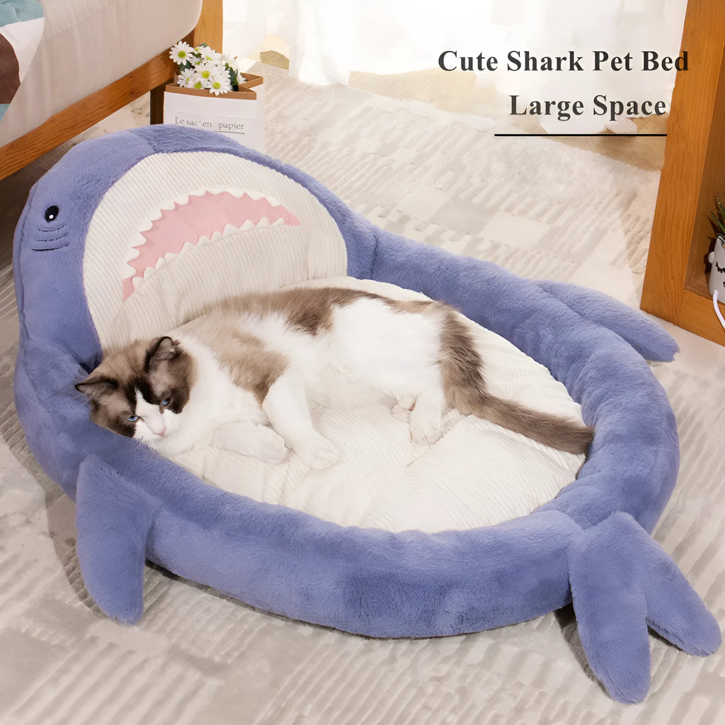 Blue shark pattern pet bed for dogs and cats with raised sides and non-slip base.