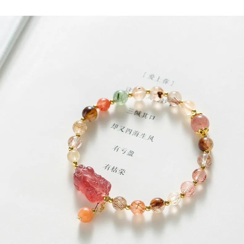 Women's crystal copper bracelet with dopamine crystal colour and pearl elements on natural stone finish