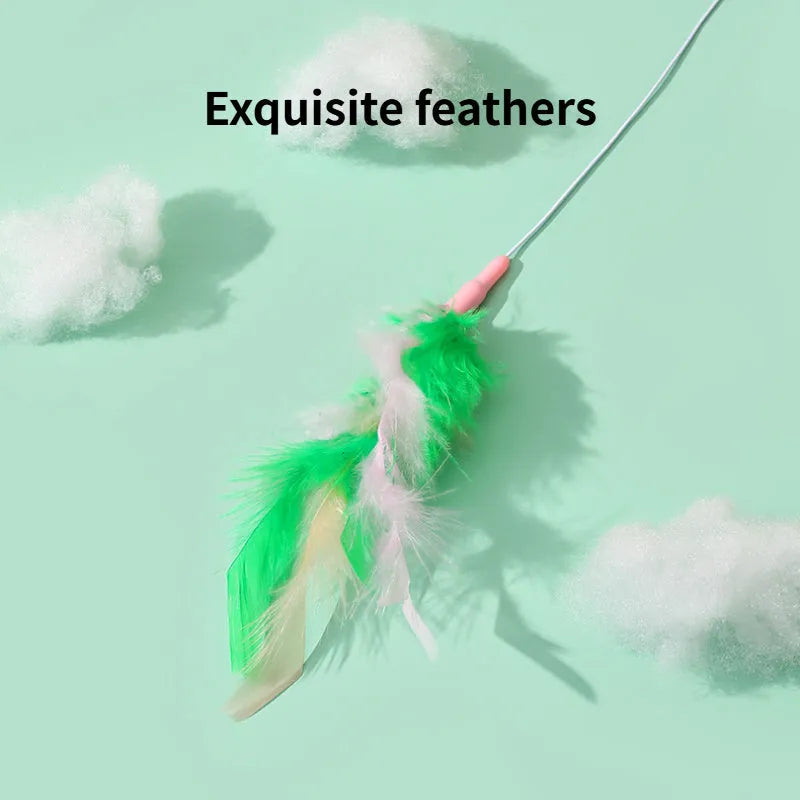 Green interactive cat toy feather wand with bell refills and feathers on a white background