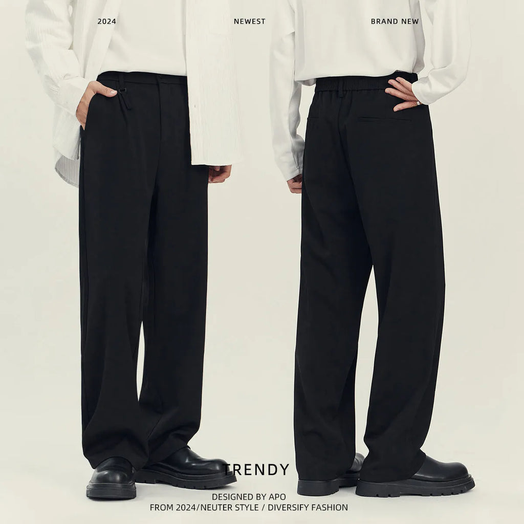Business casual draping suit pants in black with loose straight leg and solid colour design