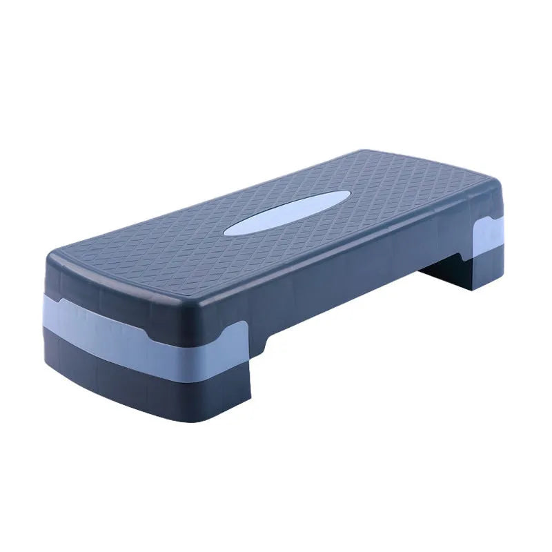 Grey Fit Step aerobic fitness stepper platform on a wooden floor.
