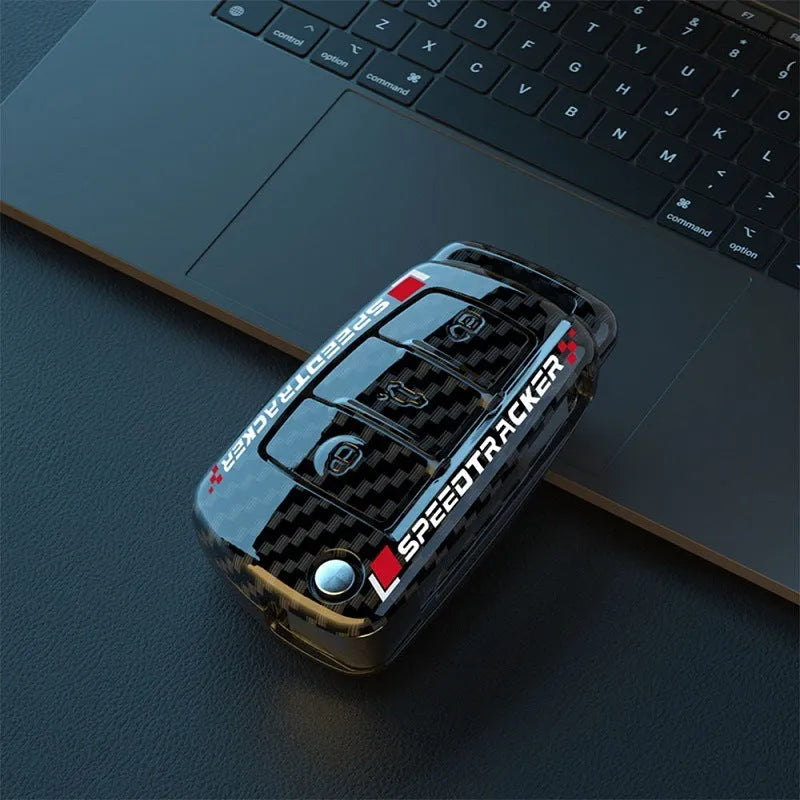 Carbon fibre style car key cover with mirror finish in carbon and white colour options