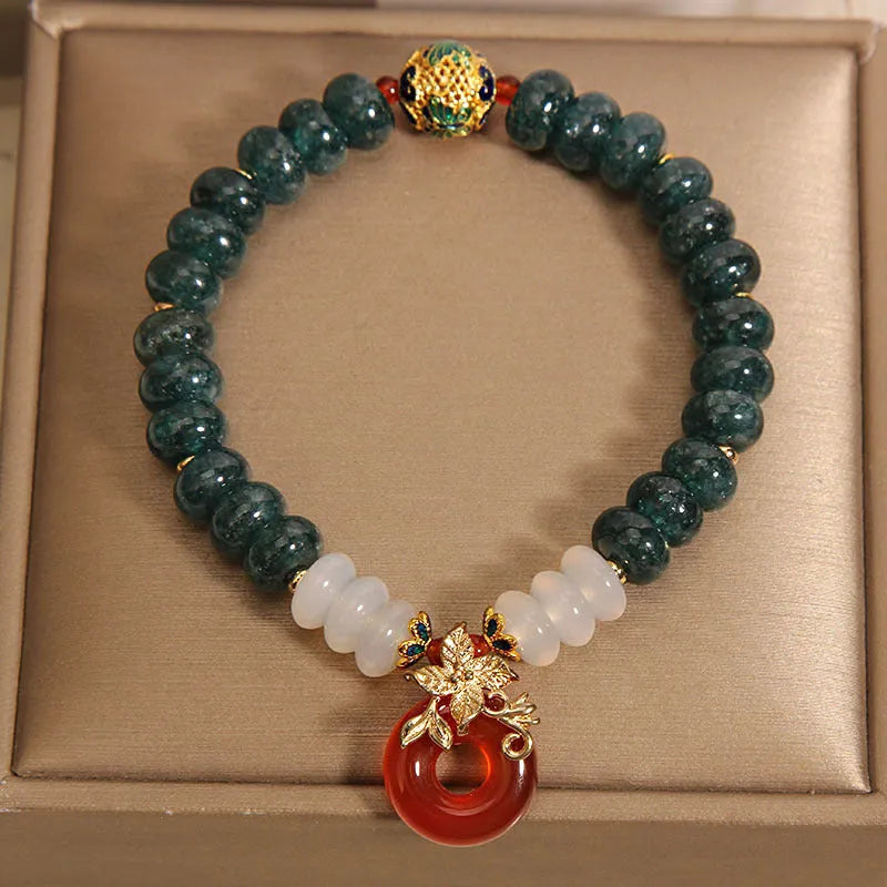 Blue water jade abacus beads crystal bracelet with red agate peace buckle and rhinestone accents for women