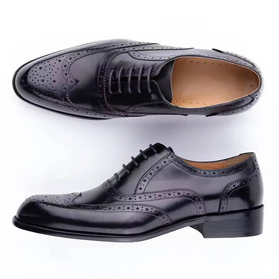 Men's hand carved cowhide Oxford shoes in black with pointed toe and low top design
