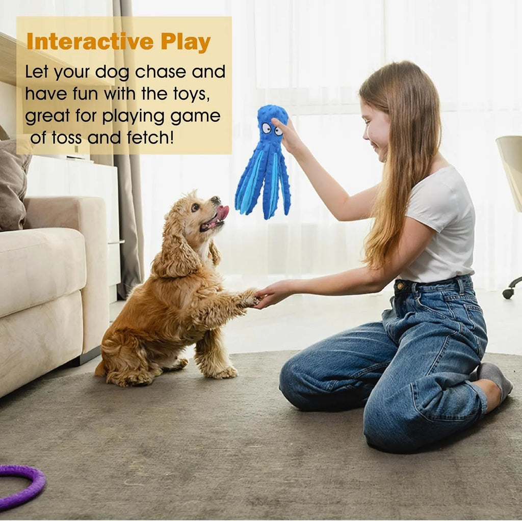 Blue octopus plush dog toy with no stuffing, featuring crinkle paper and squeaker sounds for interactive chew play.