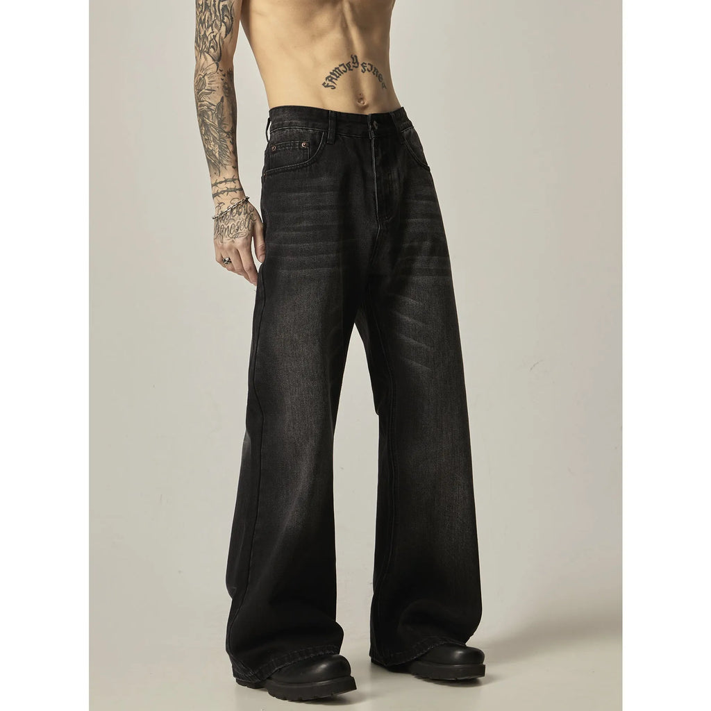 Men's black loose straight jeans with retro styling and zipper fly