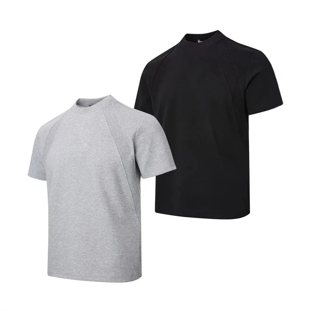 Men's black loose-fit short sleeve top with textured air layer stitching detail.